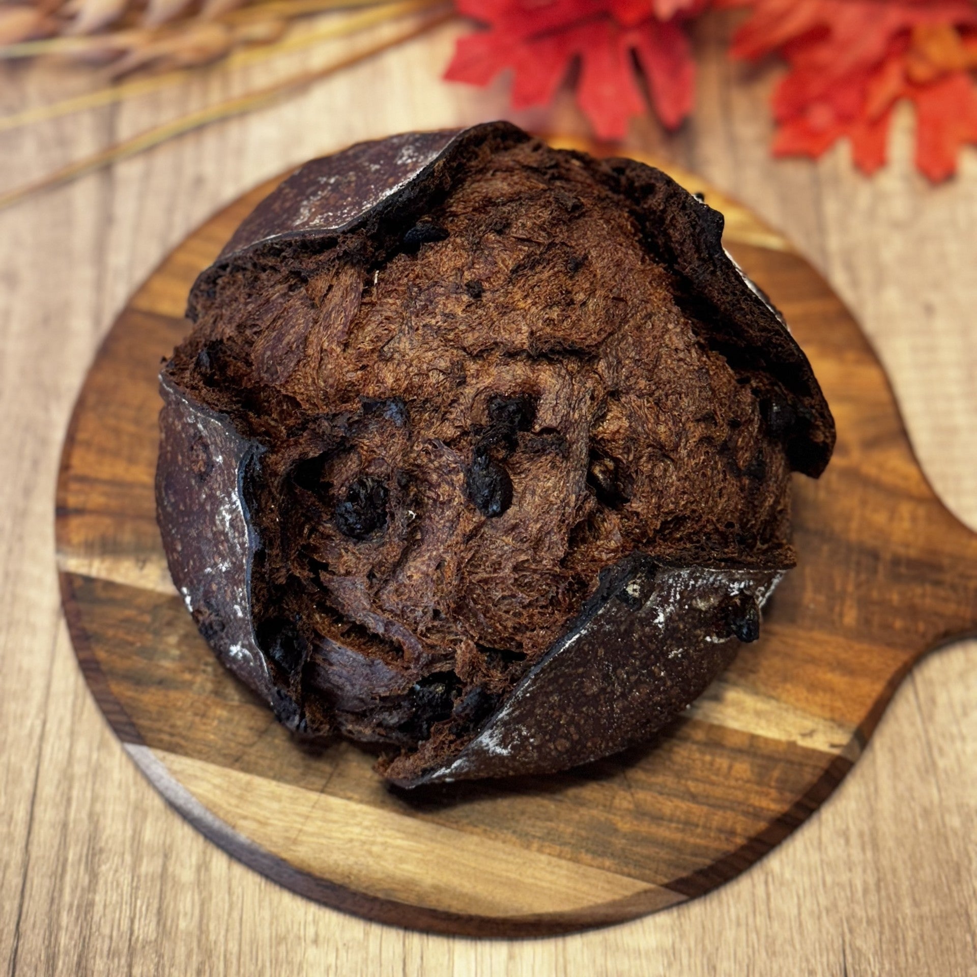 Chocolate sourdough with chocolate chips on a wooden board